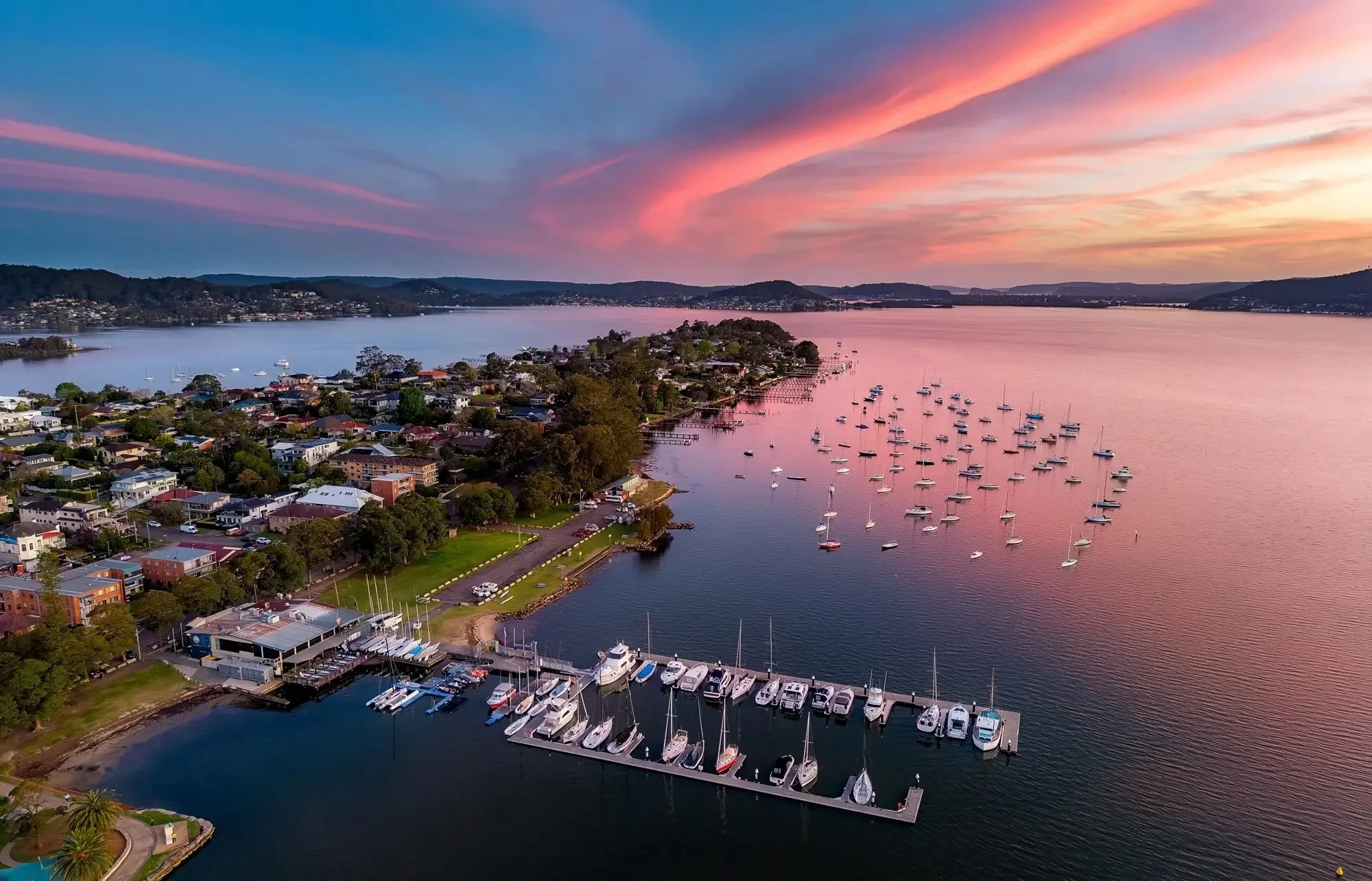 Gosford waterfront at sunset with boats anchored in Brisbane Water on the Central Coast