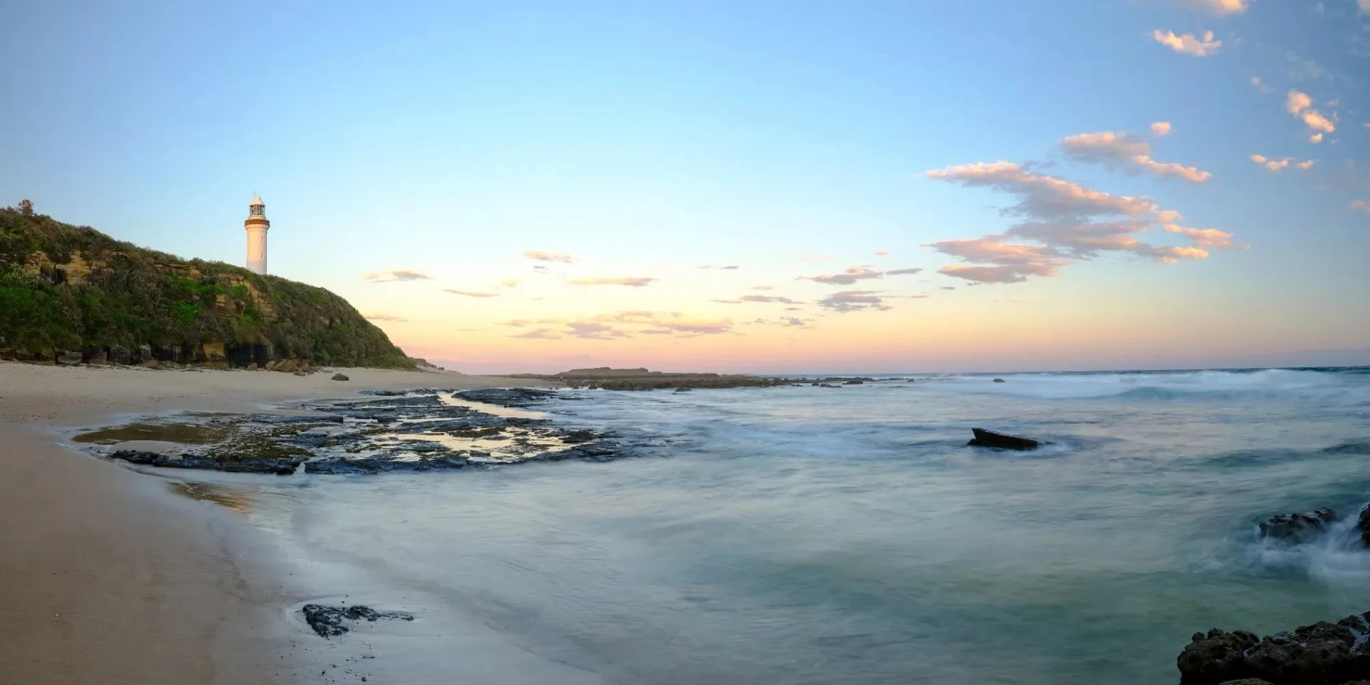 Norah Head Lighthouse overlooking the ocean at sunrise on the NSW Central Coast